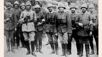 Kemal Atatürk strategizing with Ottoman military officers at the Battle of Gallipoli, Çanakkale, 1915, showcasing his early leadership.